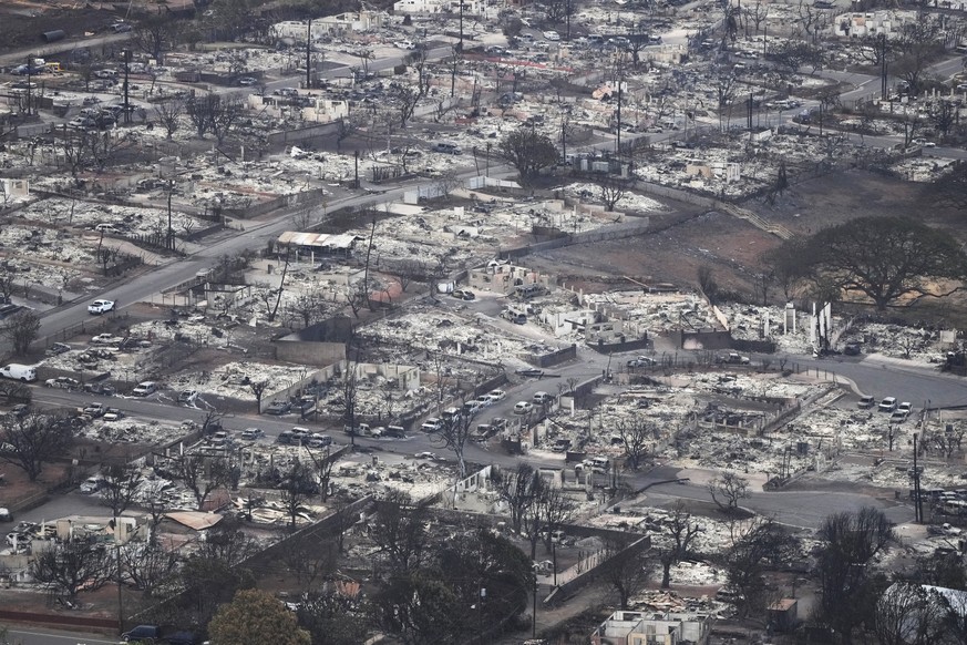Wildfire wreckage is shown Thursday, Aug. 10, 2023, in Lahaina, Hawaii. The search of the wildfire wreckage on the Hawaiian island of Maui on Thursday revealed a wasteland of burned out homes and obli ...
