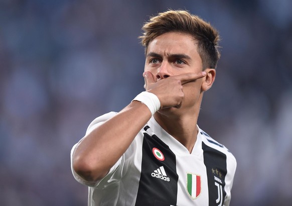 epa07064452 Juventus&#039; forward Paulo Dybala celebrates after scoring the 1-0 lead during the UEFA Champions League group stage match between Juventus FC and BSC Young Boys Bern at the Allianz Aren ...