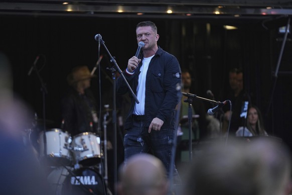 Tommy Robinson speaks during the Unite the Kingdom march and rally near Westminster, London, Saturday Sept. 13, 2025. (AP Photo/Joanna Chan)
Britain Protest