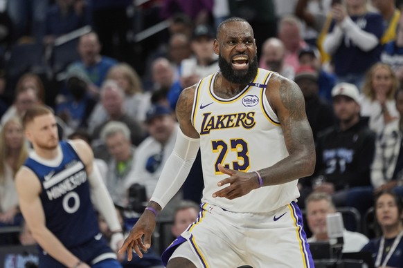 Los Angeles Lakers&#039; Lebron James reacts after a call by a referee during the second half of Game 4 of an NBA basketball first-round playoff series against the Minnesota Timberwolves, Sunday, Apri ...