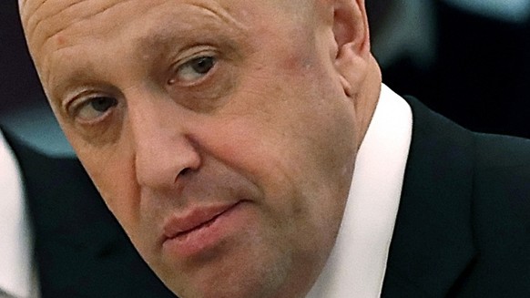 FILE - Russian businessman Yevgeny Prigozhin prior to a meeting of Russian President Vladimir Putin and Chinese President Xi Jinping in the Kremlin in Moscow, Russia, July 4, 2017. Russia has engaged  ...