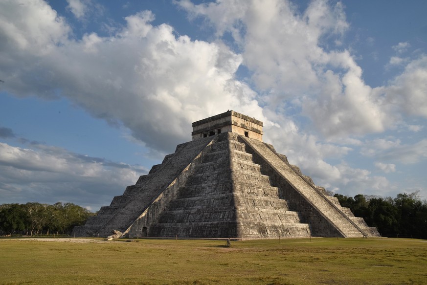 epa09089164 Photograph of the Kukulcan pyramid during the phenomenon of light and shadow, known as the Temple of the Seven Dolls, in the archaeological zone of Dzibilchaltun, in Yucatan state, Mexico, ...