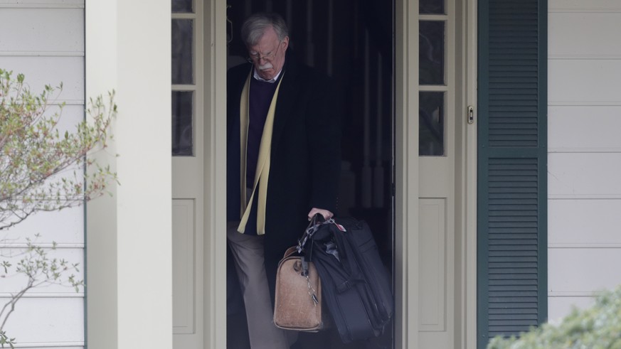 Former National security adviser John Bolton leaves his home in Bethesda, Md. Wednesday, Jan. 29, 2020. (AP Photo/Luis M. Alvarez)
John Bolton