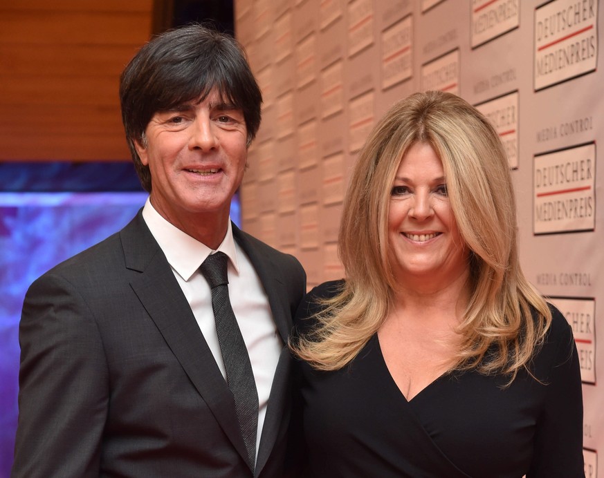 epa04579579 German national soccer coach Joachim Loew and his wife Daniela arrive at the Congress Centre in Baden-Baden, Germany, 23 January 2015. Loew will be awarded with the German Media Award 2014 ...