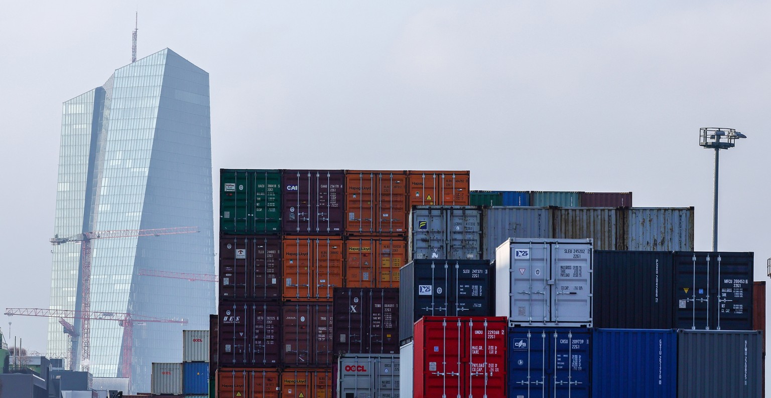 epa12661276 The European Central Bank (ECB) building is seen in the background as a cargo ship is docked in Frankfurt am Main, Germany, 19 January 2026. The United States announced new import duties o ...