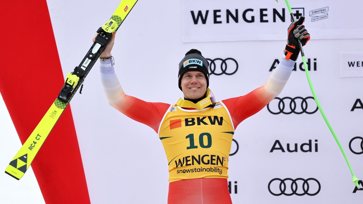 Second placed Stefan Rogentin of Switzerland celebrates on the podium after the men's Super G race at the Alpine Skiing FIS Ski World Cup in Wengen, Switzerland, Friday, January 13, 2023. (KEYSTO ...