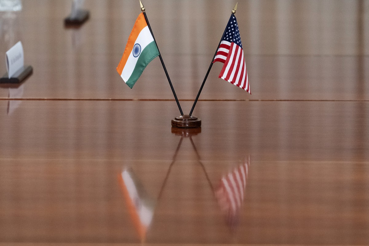 FILE- The countries' flags are seen on the table during a meeting with India's Foreign Minister Subrahmanyam Jaishankar and U.S. Secretary of Defense Lloyd Austin at the Pentagon, Monday, Se ...