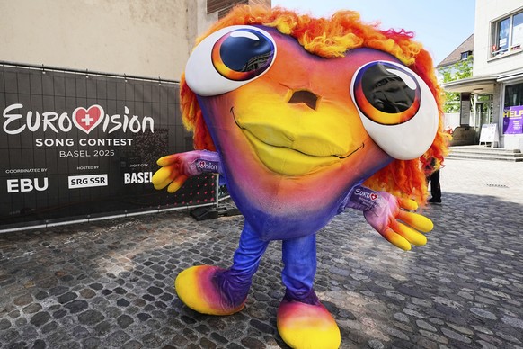 The Eurovision mascot Lumo is pictured in the city center of Basel during the 69th Eurovision Song Contest week, in Basel, Switzerland, Thursday, May 15, 2025. (AP Photo/Martin Meissner)
Switzerland E ...