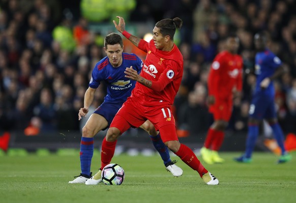 Britain Football Soccer - Liverpool v Manchester United - Premier League - Anfield - 17/10/16
Manchester United&#039;s Ander Herrera in action with Liverpool&#039;s Roberto Firmino 
Reuters / Phil N ...