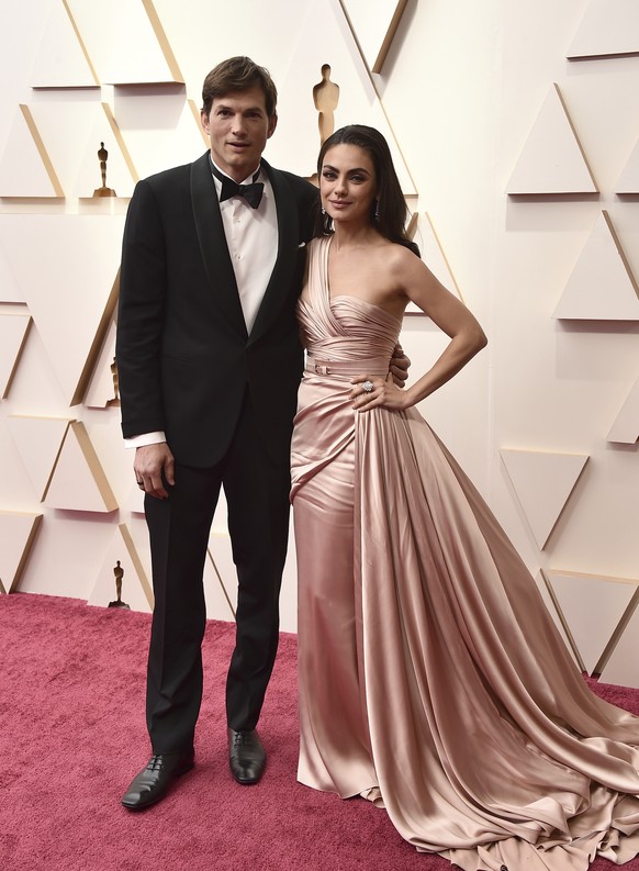 Ashton Kutcher, left, and Mila Kunis arrive at the Oscars on Sunday, March 27, 2022, at the Dolby Theatre in Los Angeles. (Photo by Jordan Strauss/Invision/AP)
Ashton Kutcher,Mila Kunis