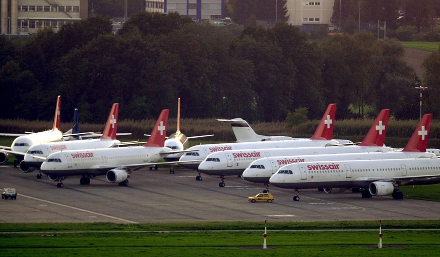 Swissair planes have to stay on the ground until further notice at the airport in Zurich-Kloten, Switzerland, Tuesday, October 2, 2001. Swissair shut down flight operations Tuesday after its schedule  ...