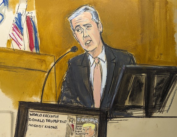 Michael Cohen testifies on the witness stand with a National Enquirer cover story about Donald Trump displayed on a screen in Manhattan criminal court, Monday, May 13, 2024, in New York. (Elizabeth Wi ...