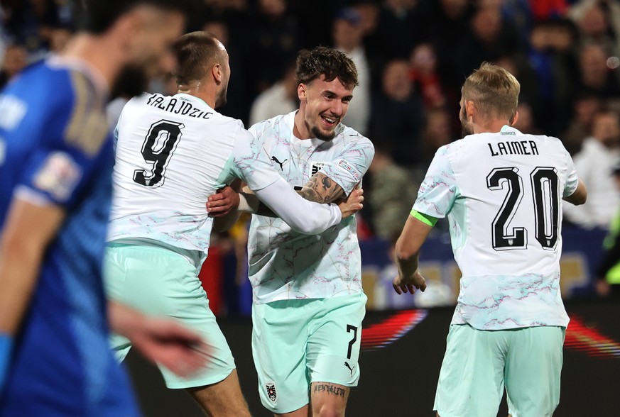 epa13281217 Austria's Christoph Lang (C) celebrates with his teammates after scoring the 1-1 goal during the UEFA Nations League match between Kosovo and Austria in Pristina, Kosovo, 04 October 2 ...