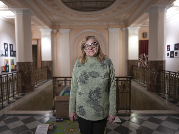 Galina Kutnyakova, teacher and survivor of the bombing at the Donetsk Academic Regional Drama Theatre in Mariupol, Ukraine, poses for a photo at the Lviv Regional Academic Puppet Theater in Lviv, Ukra ...