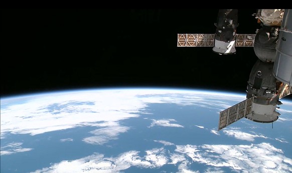 This August 12, 2014 NASA image from video taken by High Definition Earth Viewing (HDEV) experiment aboard the ISS, mounted on the External Payload Facility of the European Space Agency’s Columbus mod ...