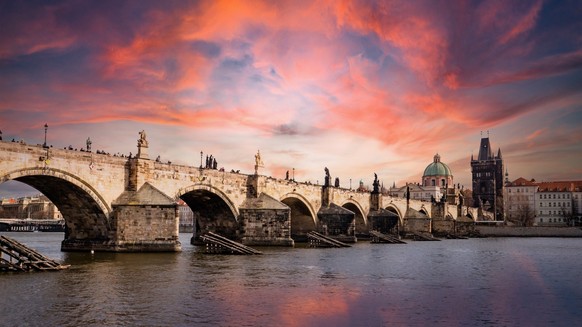 Prague, the capital of the Czech Republic, is bisected by the Vltava River.  Nicknamed 'the city of a hundred spires', it is known for its old town square, the heart of its historic core, with col...