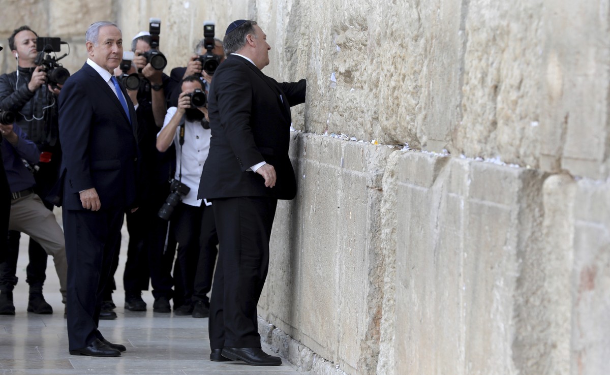 From left, Israeli Prime Minister Benjamin Netanyahu and U.S. Secretary of State Mike Pompeo visit the Western Wall in Jerusalem's Old City, Thursday, March 21, 2019. (Abir Sultan/Pool Image via  ...