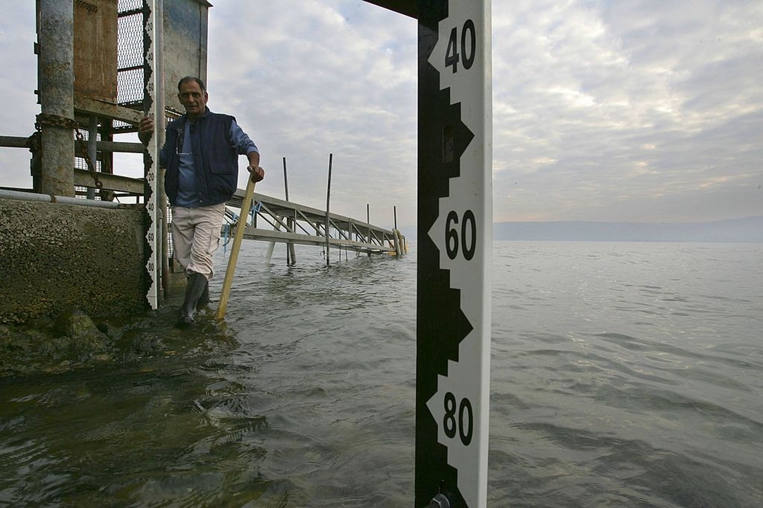 TIBERIUS, ISRAEL - JANUARY 9: Shuli Chen takes the daily measurement of the water level of the Sea of Galilee for the Israeli Water Authority January 9, 2007 at Tiberius in northern Israel. With the w ...