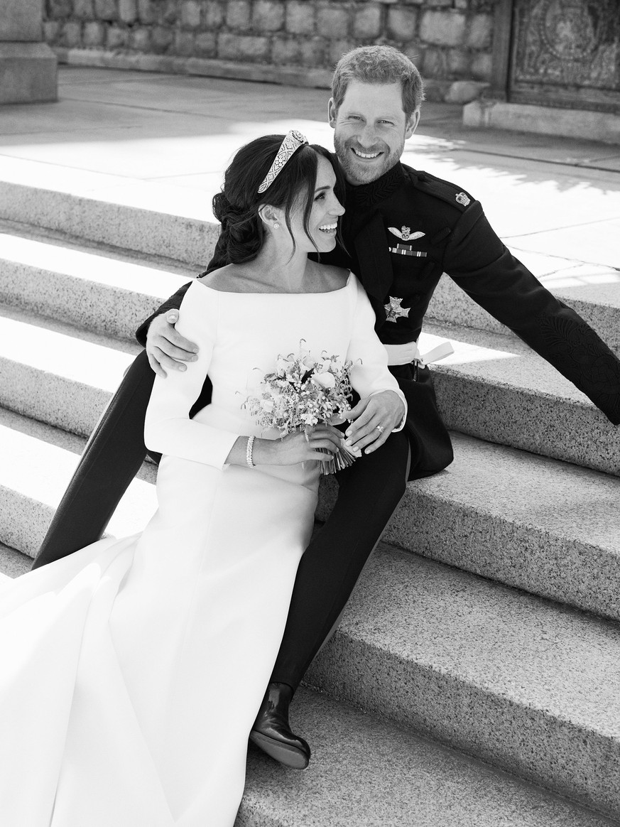 This photo released by Kensington Palace on Monday May 21, 2018, shows an official wedding photo of Britain&#039;s Prince Harry and Meghan Markle, on the East Terrace of Windsor Castle, Windsor, Engla ...