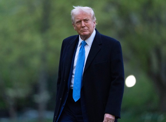 President Donald Trump walks on the South Lawn as he arrives at the White House on Marine One, Sunday, April 6, 2025, in Washington. (AP Photo/Manuel Balce Ceneta)
Donald Trump