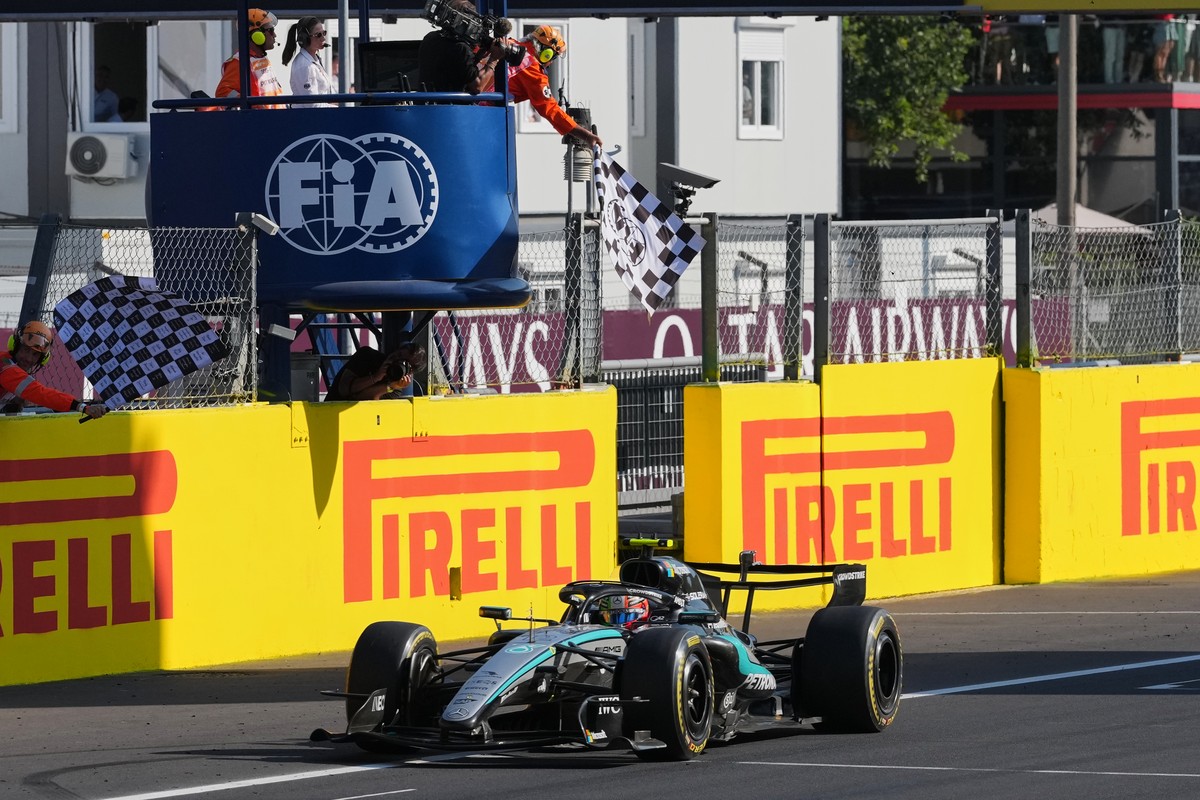 Mercedes driver Andrea Kimi Antonelli of Italy crosses the finish line to win the Italian Formula One Grand Prix race, in Monza, Italy, Sunday, Sept. 6, 2026. (AP Photo/Antonio Calanni)
Andrea Kimi An ...