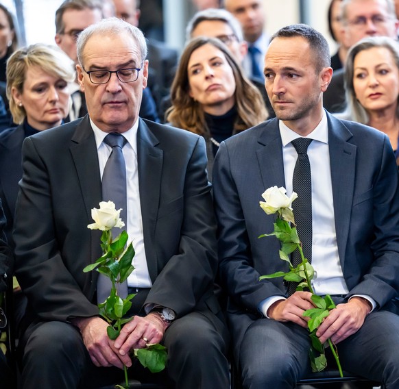 Swiss Federal President Guy Parmelin, left, Mathias Reynard, centre, State Councillor and president of the Council of State of the Canton of Valais, and Christophe Darbellay, right, State Councillor o ...