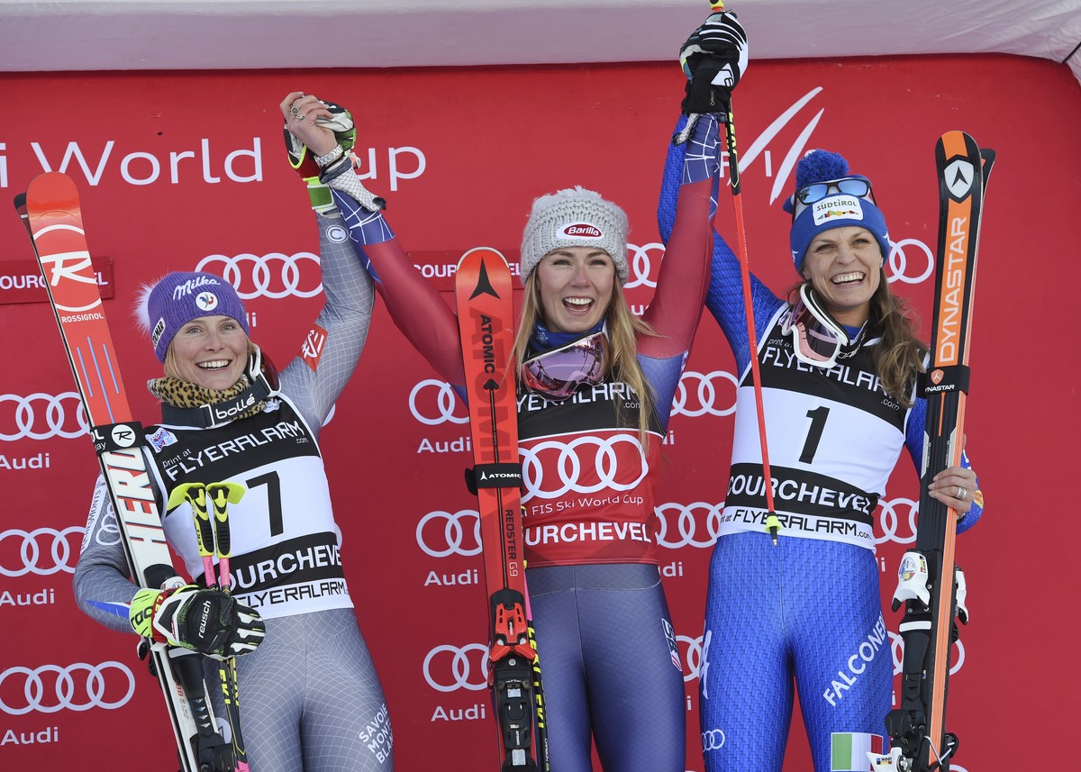 United States's Mikaela Shiffrin, center, the winner, poses with runner-up France's Tessa Worley, left, and third placed Italy's Manuela Moelgg, on the podium of an alpine ski, women  ...