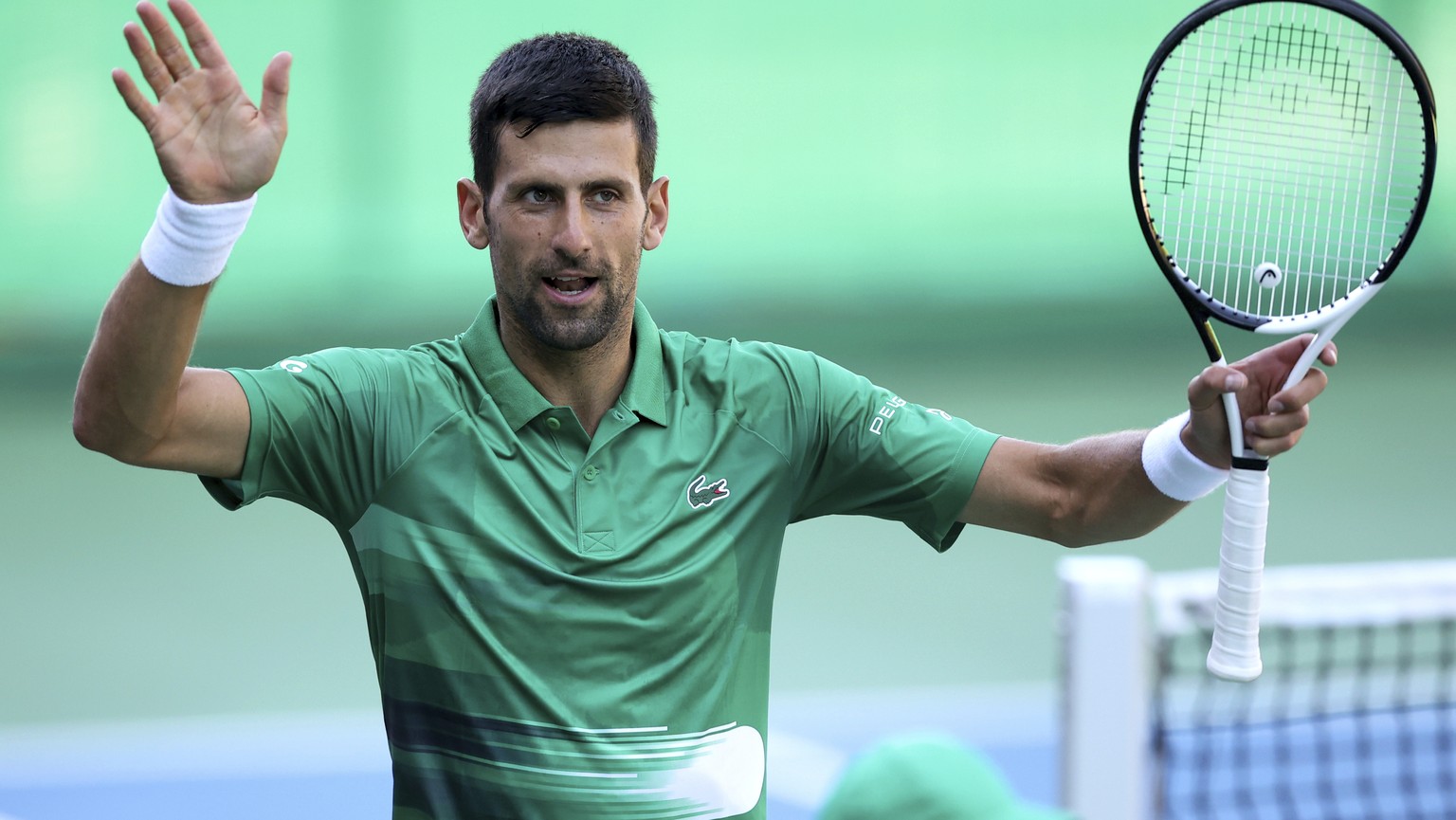 Serbia&#039;s Novak Djokovic reacts while playing an exhibition match against Croatia&#039;s Ivan Dodig in Visoko, Bosnia, Wednesday, July 13, 2022. (AP Photo/Armin Durgut)