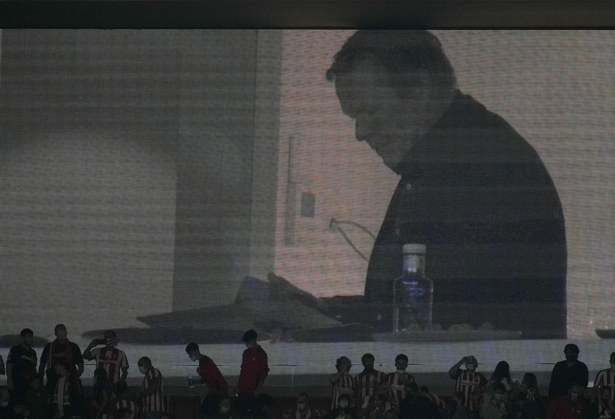 An image of Barcelona's head coach Ronald Koeman appears on a screen after the La Liga soccer match between Atletico Madrid and Barcelona at the Estadio Wanda Metropolitano in Madrid, Saturday, O ...