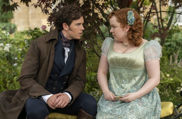 Bridgerton. (L to R) Luke Newton as Colin Bridgerton, Nicola Coughlan as Penelope Featherington in episode 301 of Bridgerton. Cr. Liam Daniel/Netflix © 2024