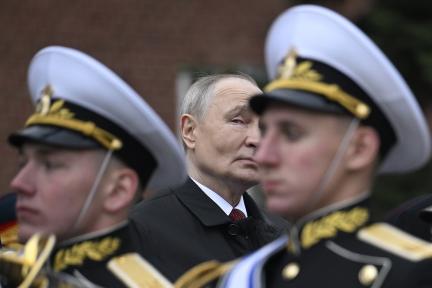 epa12943019 Russian President Vladimir Putin attends a ceremony to lay flowers at the Tomb of the Unknown Soldier by the Kremlin wall in central Moscow Russia, 09 May 2026. Russia marks the 81st anniv ...