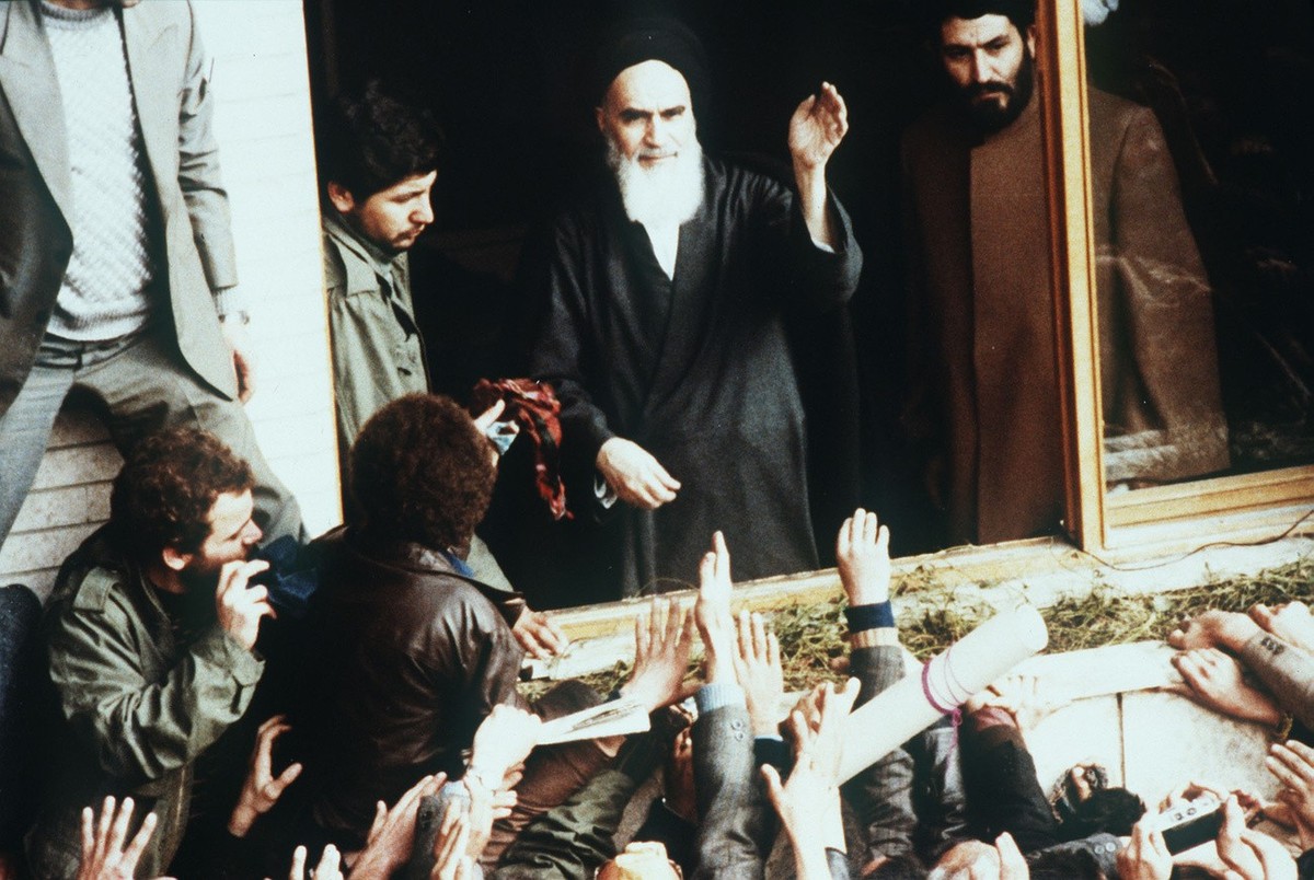 Iran's new leader, the Shiite Moslem Ayatollah Khomeini is wildly acclaimed by waiting crowds shortly after his return to Teheran, Iran, during the year 1979, from a prolonged exile abroad. (KEYS ...
