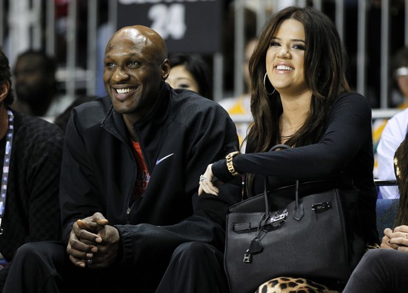 Odom mit damaligen Ehefrau Khloé Kardashian bei einem Spiel der L.A. Lakers im Februar 2011.