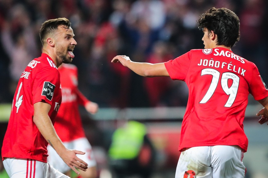 epa07397695 Benfica&#039;s Joao Felix (R) celebrates with Haris Seferovic after scoring a goal against Desportivo de Chaves during the Portuguese First League Soccer match at Luz Stadium in Lisbon, Po ...