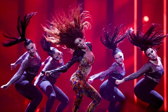 epaselect epa06720506 Eleni Foureira (C) representing Cyprus with &#039;Fuego&#039; performs during the First Semi-Final of the 63rd annual Eurovision Song Contest (ESC) at the Altice Arena in Lisbon, ...