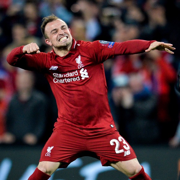 epa07554684 Liverpool&#039;s Xherdan Shaqiri reacts after winning the UEFA Champions League semi final second leg soccer match between Liverpool FC and FC Barcelona in Liverpool, Britain, 07 May 2019. ...