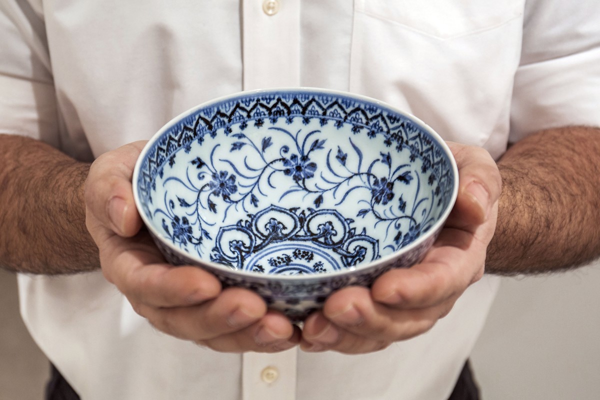 This photo, provided by Sotheby's, in New York, on Tuesday, March 2, 2021, shows a small porcelain bowl bought for $35 at a Connecticut yard sale that turned out to be a rare, 15th century Chines ...