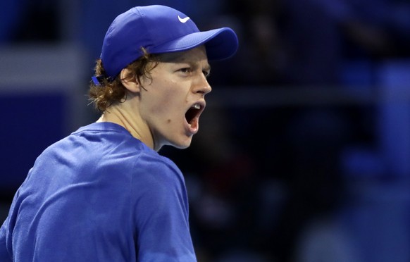 Jannik Sinner of Italy, celebrates a winning point during the ATP Next Gen tennis tournament semifinal match against Miomir Kecmanovic of Serbia, in Milan, Italy, Friday, Nov. 8, 2019. (AP Photo/Luca  ...