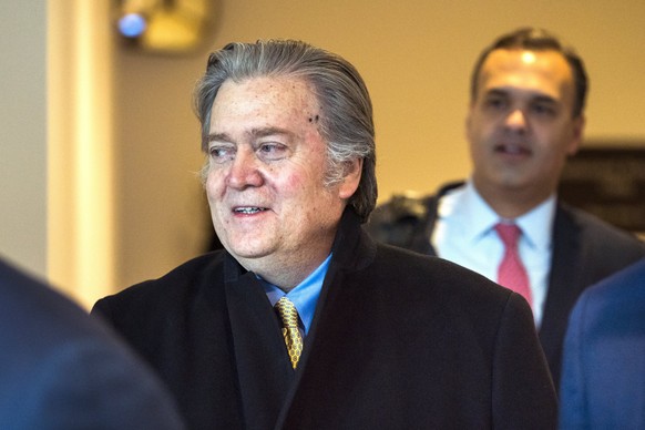 epa06528958 Former White House strategist Steve Bannon (L) arrives to testify before the House Intelligence Committee in the US Capitol in Washington, DC, USA, 15 February 2018. Bannon returned to spe ...