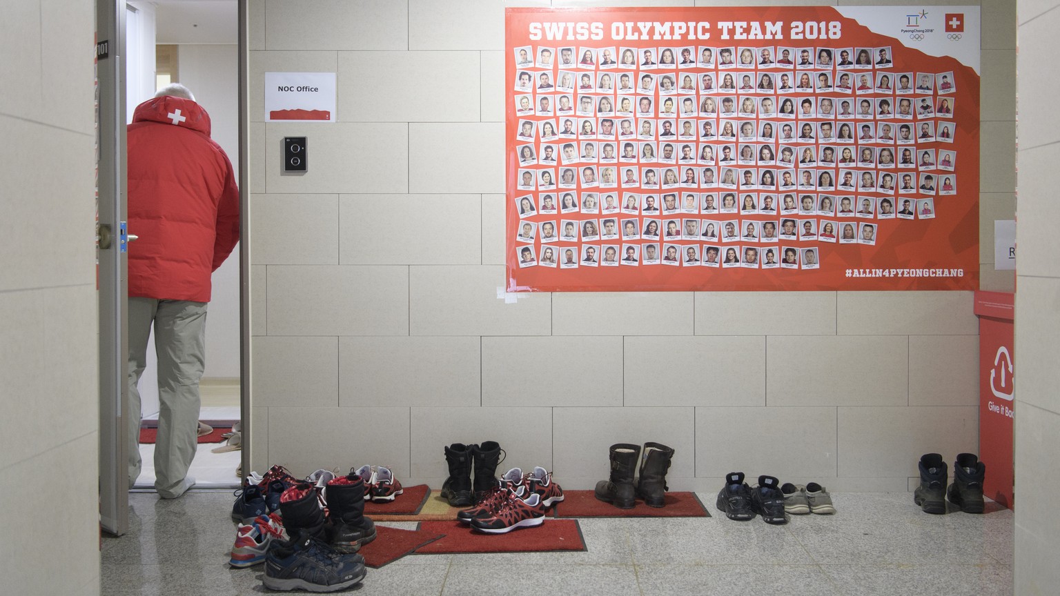 Shoes outside the housing of team switzerland are pictured during a media tour through the Pyeongchang Olympic Village one day prior to the opening of the XXIII Winter Olympics 2018 in Pyeongchang, So ...