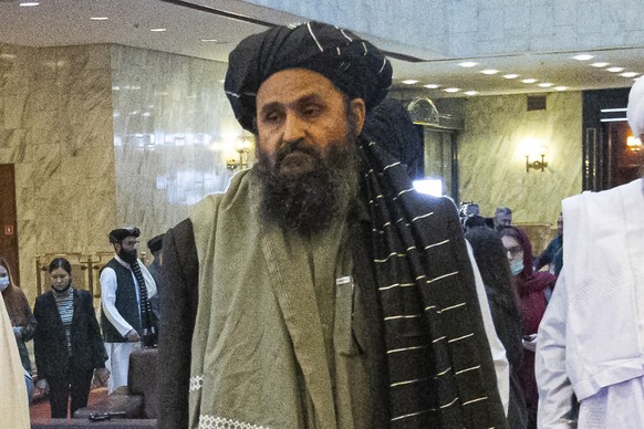 FILE - In this March 18, 2021, file photo, Taliban co-founder Mullah Abdul Ghani Baradar, arrives with other members of the Taliban delegation for an international peace conference in Moscow, Russia.  ...