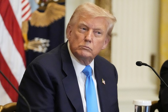 President Donald Trump listens at an event to promote his proposal to improve Americans&#039; access to their medical records in the East Room of the White House, Wednesday, July 30, 2025, in Washingt ...