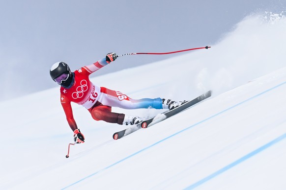 Michelle Gisin of Switzerland competes in women&#039;s downhill training at the at the 2022 Olympic Winter Games in Yanqing, China, on Saturday, February 12, 2022. (KEYSTONE/Jean-Christophe Bott)