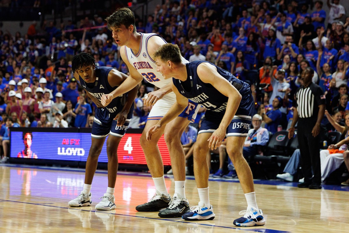 NCAA, College League, USA Basketball: North Florida at Florida Nov 6, 2025 Gainesville, Florida, USA North Florida Ospreys guard Dante Oliver 5 and North Florida Ospreys forward Nestor Dyachok 24 atte ...