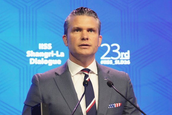 U.S. Defense Secretary Pete Hegseth delivers his address during the Shangri-La Dialogue, Asia's annual defense and security forum, in Singapore, Saturday, May 30, 2026. (AP Photo/Achmad Ibrahim)
 ...