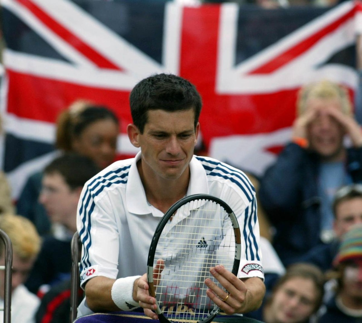 WIM41 - 20020701 - WIMBLEDON, UNITED KINGDOM : Britain's Tim Henman during a break in the fourth round match against Swiss Michel Kratochvil at the Wimbledon Tennis Championships, 01 July 2002. E ...