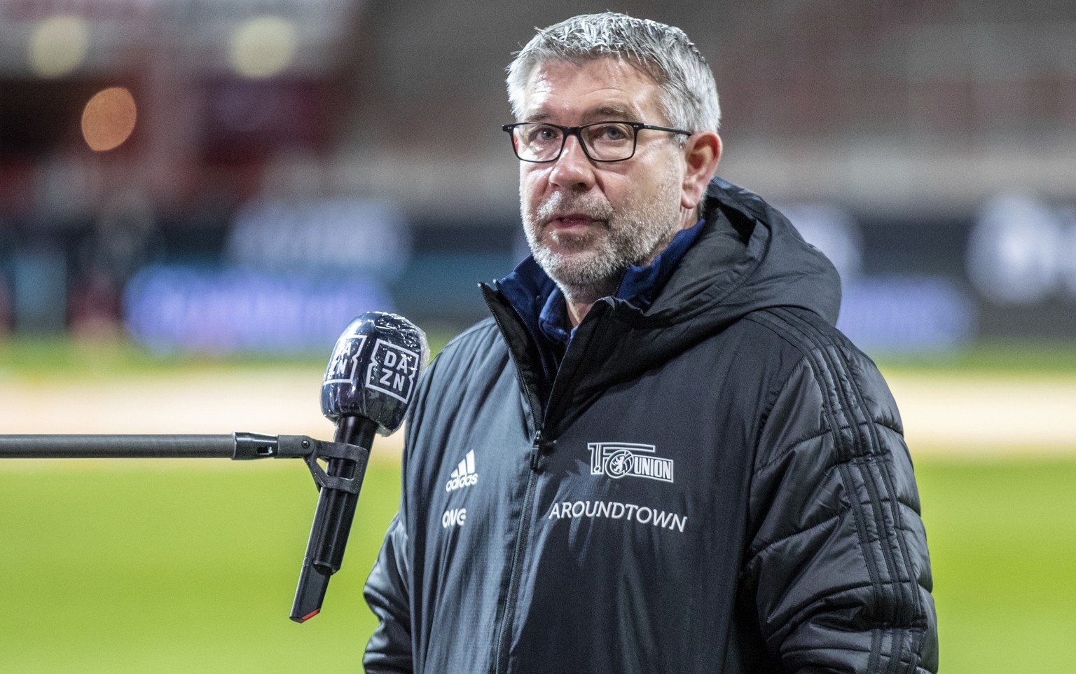 Union Berlin coach Urs Fischer speaks in an interview before the start of the Bundesliga soccer match between Union Berlin and Bayer Leverkusen at Stadion An der Alten Forsterei in Berlin, Germany, Fr ...