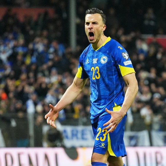 epa12863018 Haris Tabakovic of Bosnia and Herzegovina celebrates after scoring in the penalty shoot-out during the FIFA World Cup 2026 European playoff match between Bosnia and Herzegovina and Italy i ...