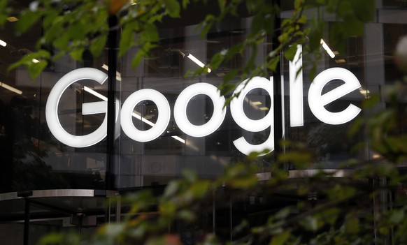 FILE - In this Thursday Nov. 1, 2018, file photo is the Google logo displayed at their offices in Granary Square, in London. Three tech companies that have amassed unparalleled influence while reshapi ...