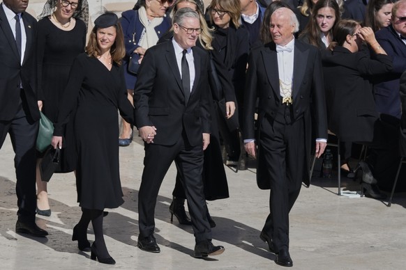 British Prime Minister Keir Starmer, center, and his wife Victoria arrive for the funeral of Pope Francis in St. Peter's Square at the Vatican, Saturday, April 26, 2025. (AP Photo/Gregorio Borgia ...